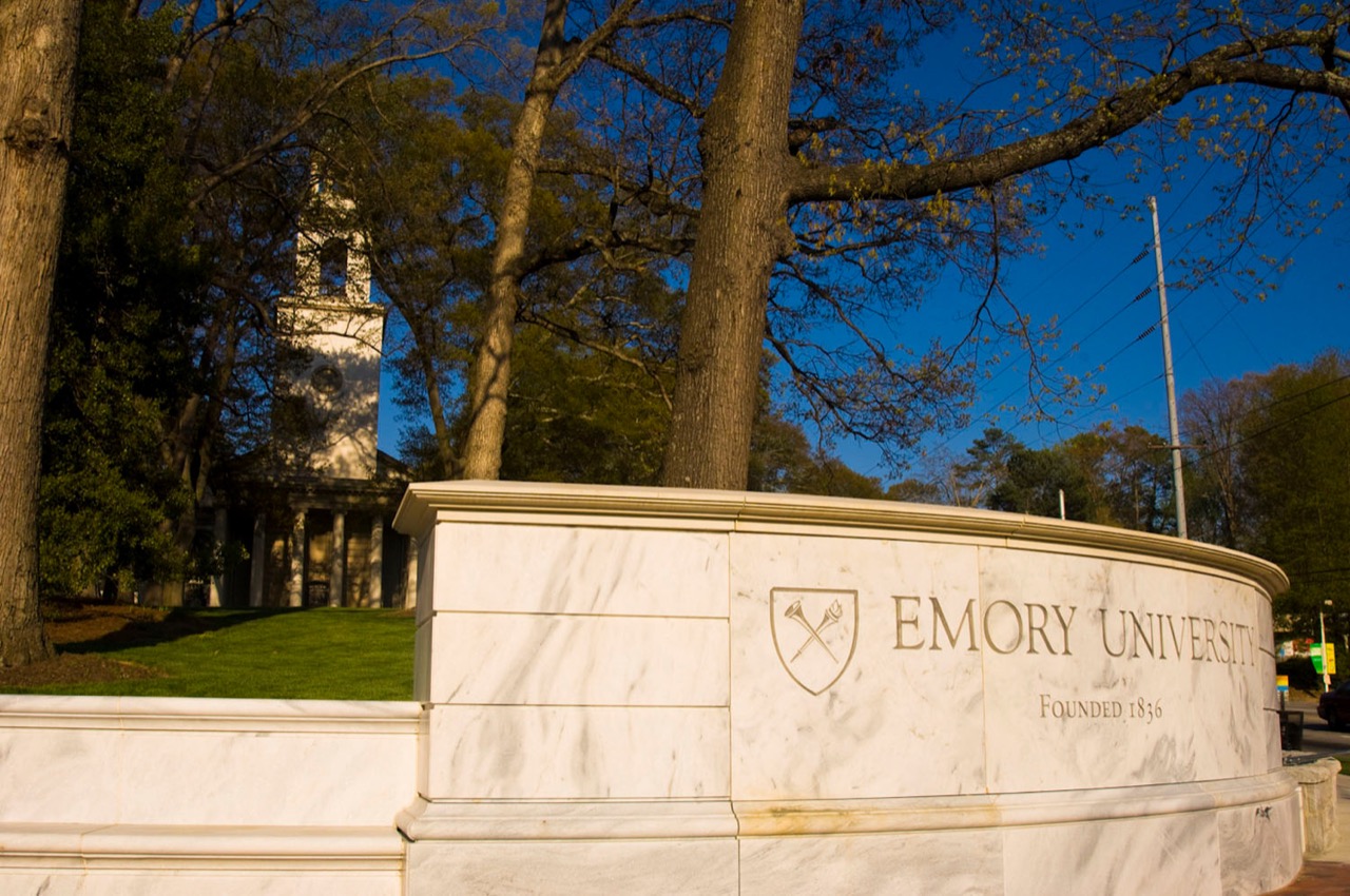 marble wall that says emory university