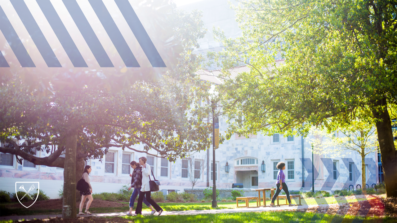 students walking in front of marble buildings with arrow graphics in corners