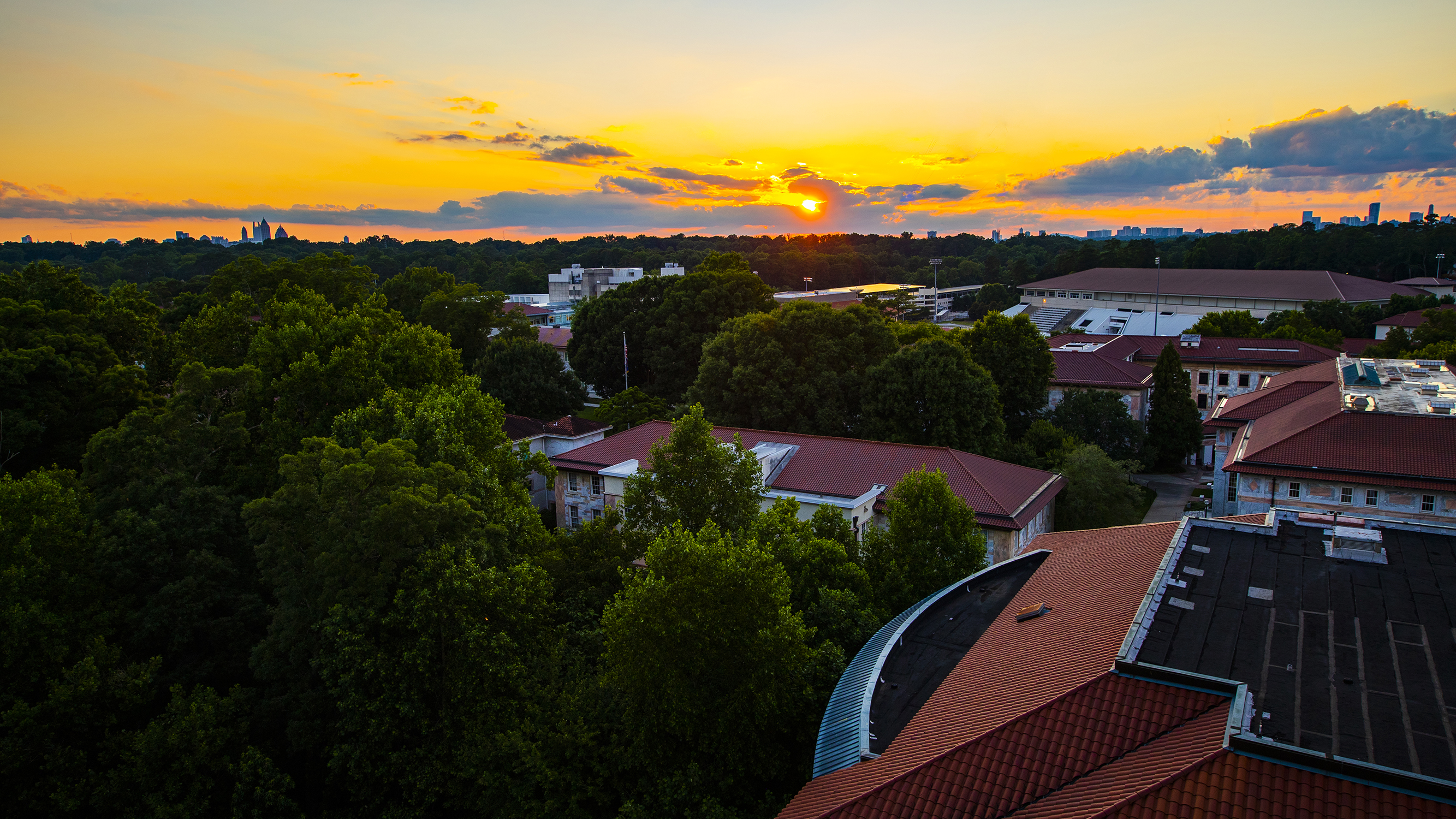 aerial shot of campus with sun setting